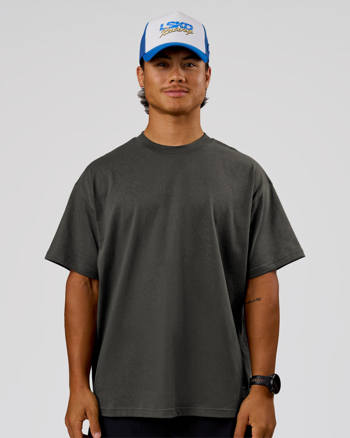 Man wearing Strata Heavyweight Oversized Tee - Onyx | Model:George | Size:M