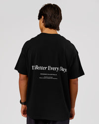 Man wearing VS26 1% Better FLXCotton Oversize Tee - Black-White | Model:George | Size:M | Thumbnail Index: 1