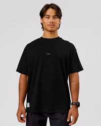 Man wearing VS26 1% Better FLXCotton Oversize Tee - Black-White | Model:George | Size:M | Thumbnail Index: 7