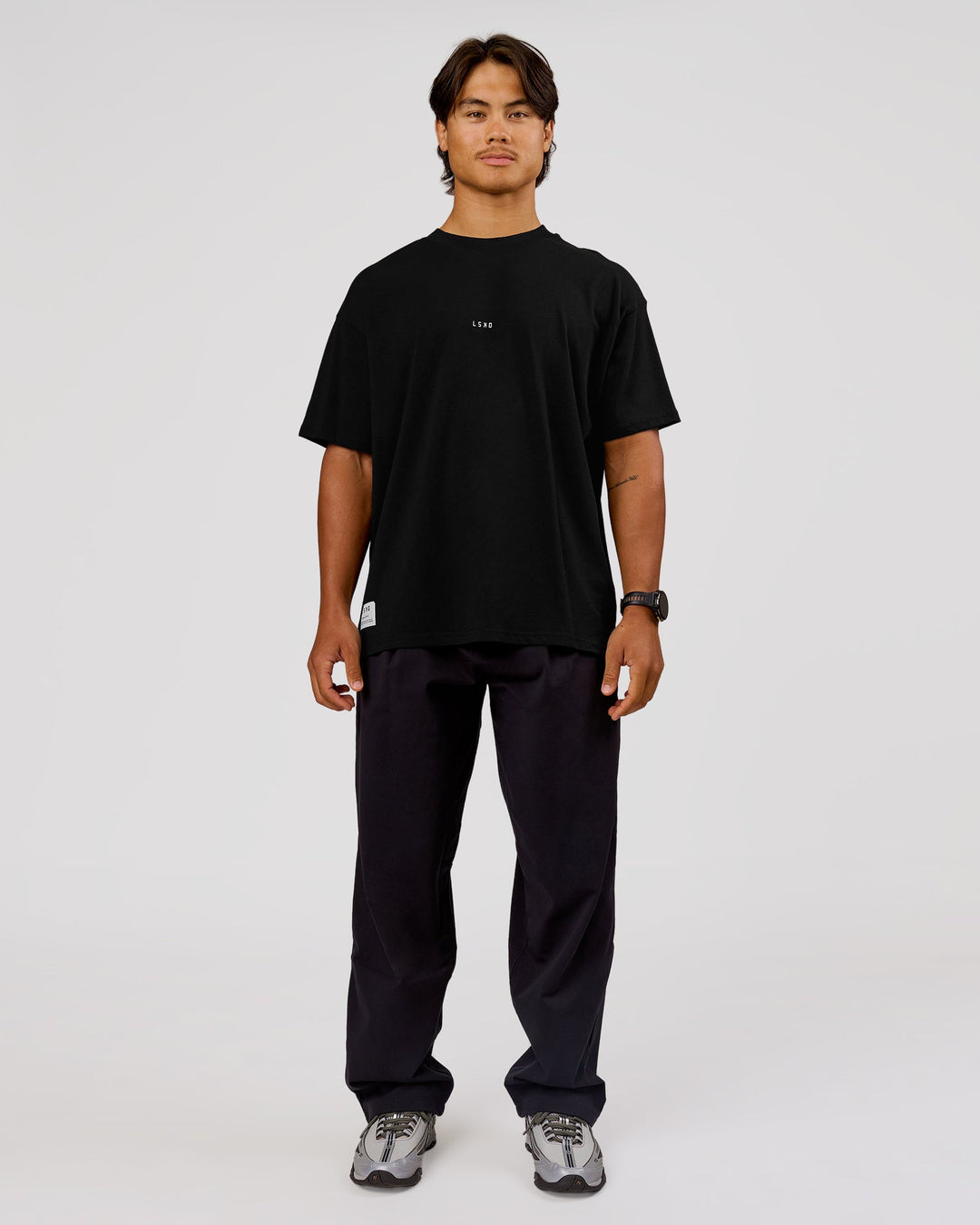 Man wearing VS26 1% Better FLXCotton Oversize Tee - Black-White | Model:George | Size:M - view 10