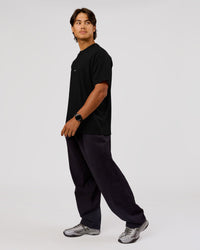 Man wearing VS26 1% Better FLXCotton Oversize Tee - Black-White | Model:George | Size:M | Thumbnail Index: 11