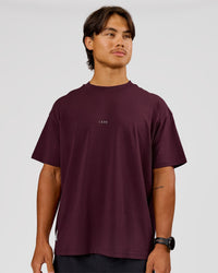 Man wearing VS26 1% Better FLXCotton Oversize Tee - Cherry Lacquer-Off White | Model:George | Size:M | Thumbnail Index: 4