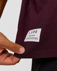 Man wearing VS26 1% Better FLXCotton Oversize Tee - Cherry Lacquer-Off White | Model:George | Size:M | Thumbnail Index: 11