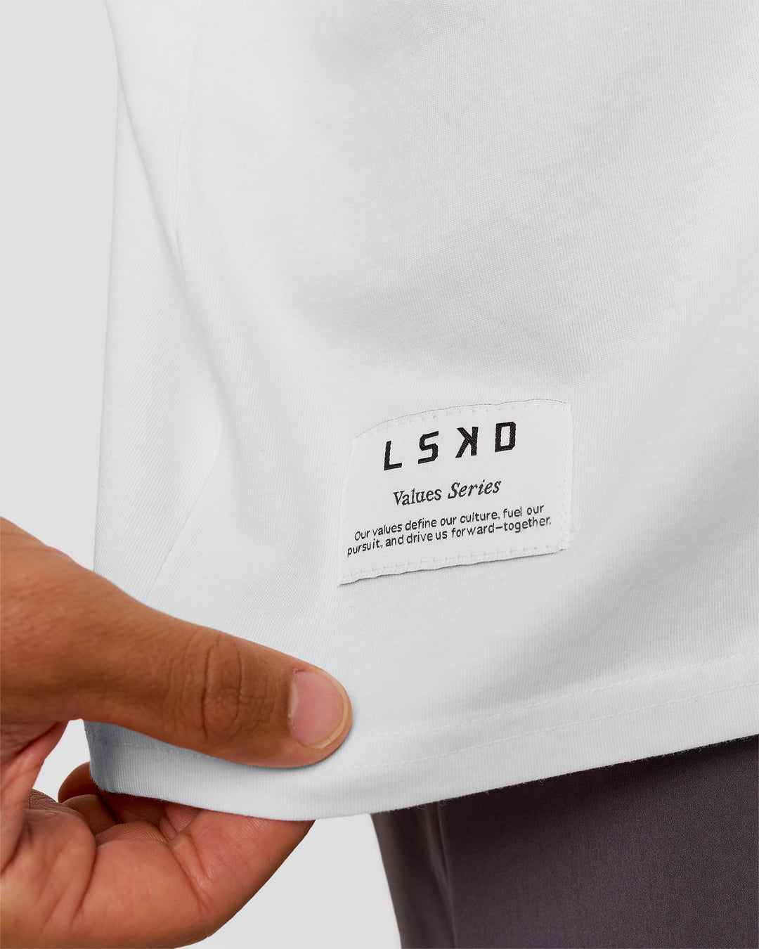 Man wearing VS26 1% Better FLXCotton Oversize Tee - White-Black | Model:George | Size:M - view 8