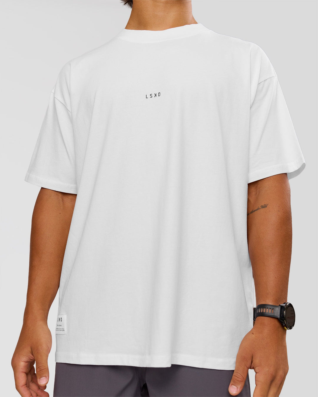 Man wearing VS26 1% Better FLXCotton Oversize Tee - White-Black | Model:George | Size:M - view 10