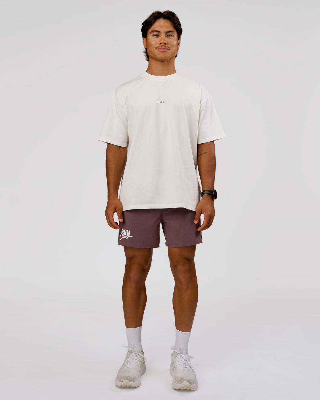 Man wearing Run Club Unisex Oversized Heavyweight FLXCotton Tee - Off White | Model:George | Size:M - view 5