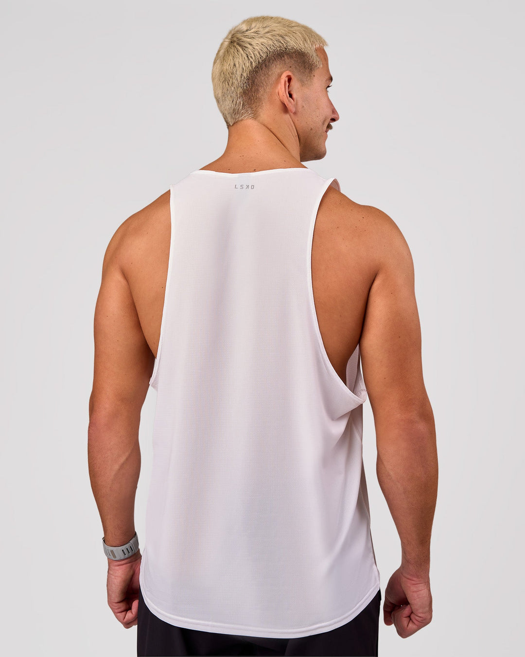 Man wearing Pace Running Tank 3.0  - White | Model:Jaiden | Size:M - view 2