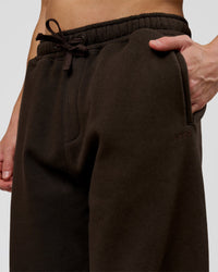 Man wearing Base Baggy Cuffed Track Pant - Ground Coffee | Model:Leandro | Size:M | Thumbnail Index: 3