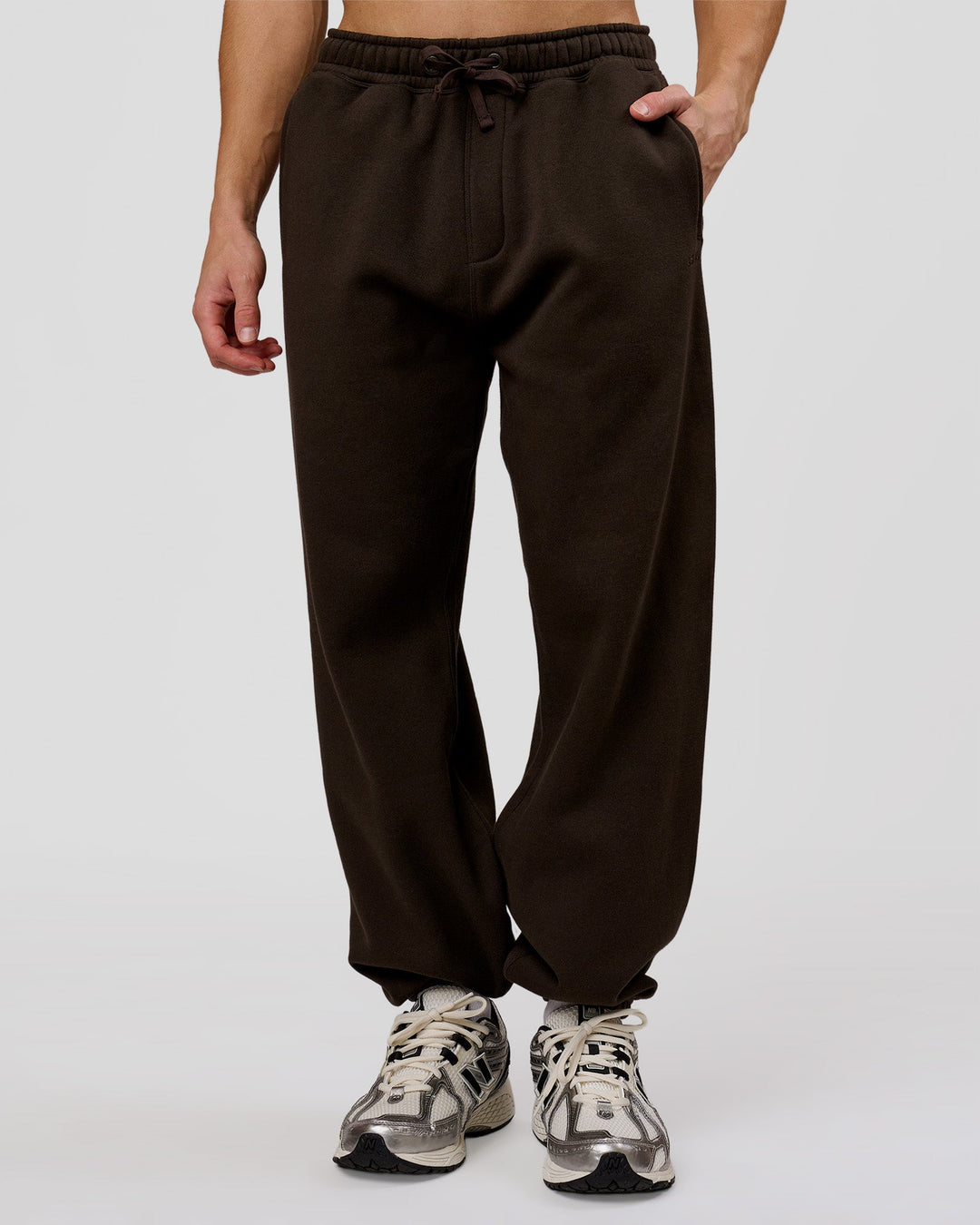 Man wearing Base Baggy Cuffed Track Pant - Ground Coffee | Model:Leandro | Size:M - view 6