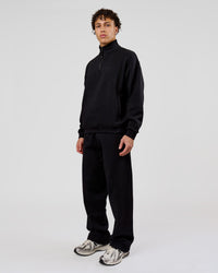 Man wearing Base Quarter Zip Sweater - Black | Model:Leandro | Size:M | Thumbnail Index: 12
