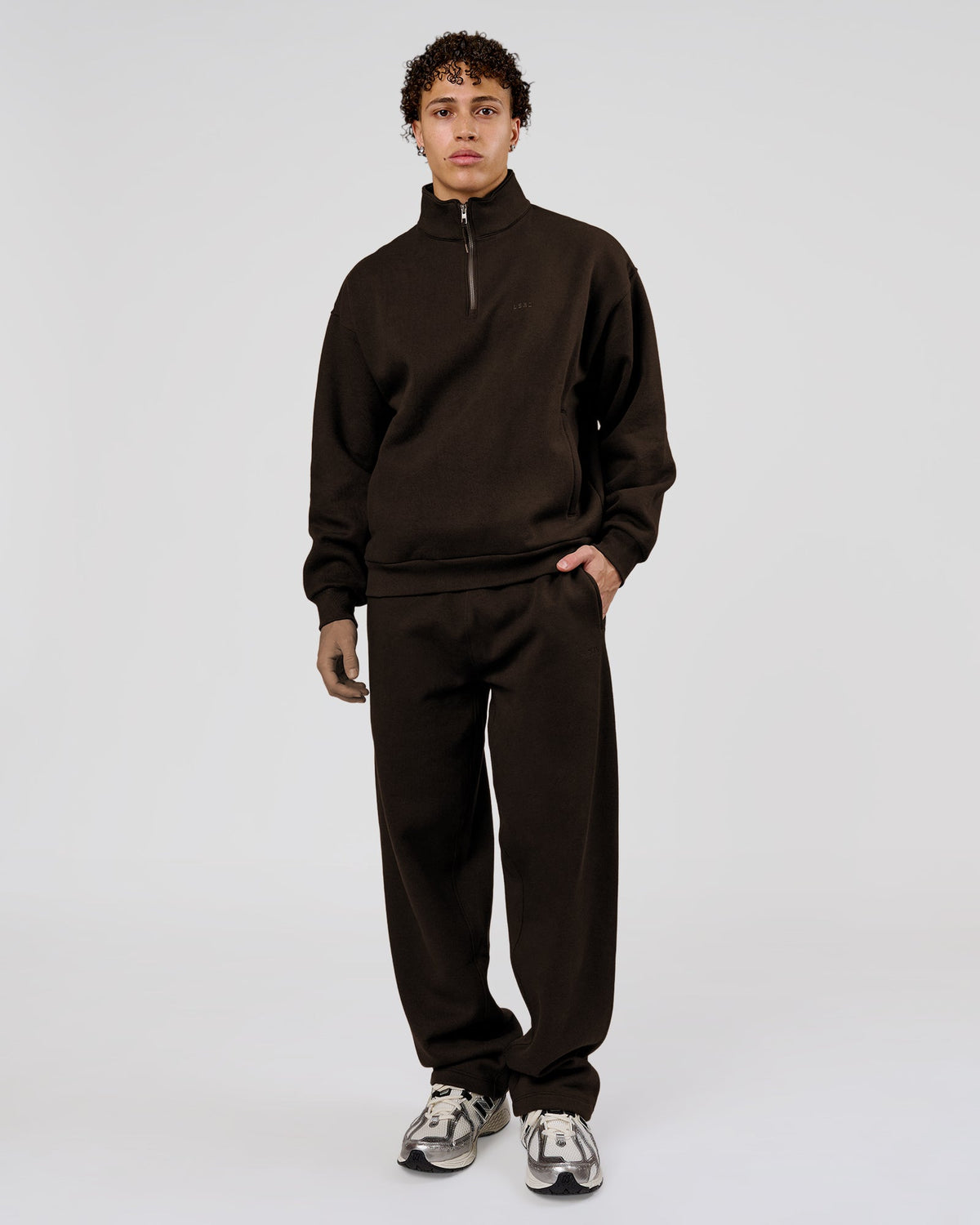 Man wearing Base Quarter Zip Sweater - Ground Coffee | Model:Leandro | Size:M - view 2