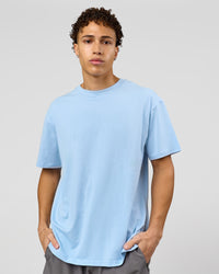 Man wearing Benchmark FLXCotton Oversized Tee - Open Air-Blue Bell | Model:Leandro | Size:M