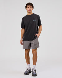Man wearing Blended FLXCotton Oversize Tee  - Black Washed | Model:Leandro | Size:M | Thumbnail Index: 11