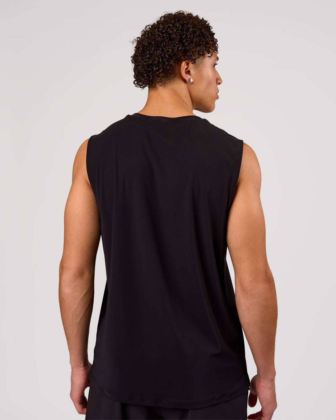 Man wearing Cadence MicroMotion Muscle Tank - Black | Model:Leandro | Size:M - view 2