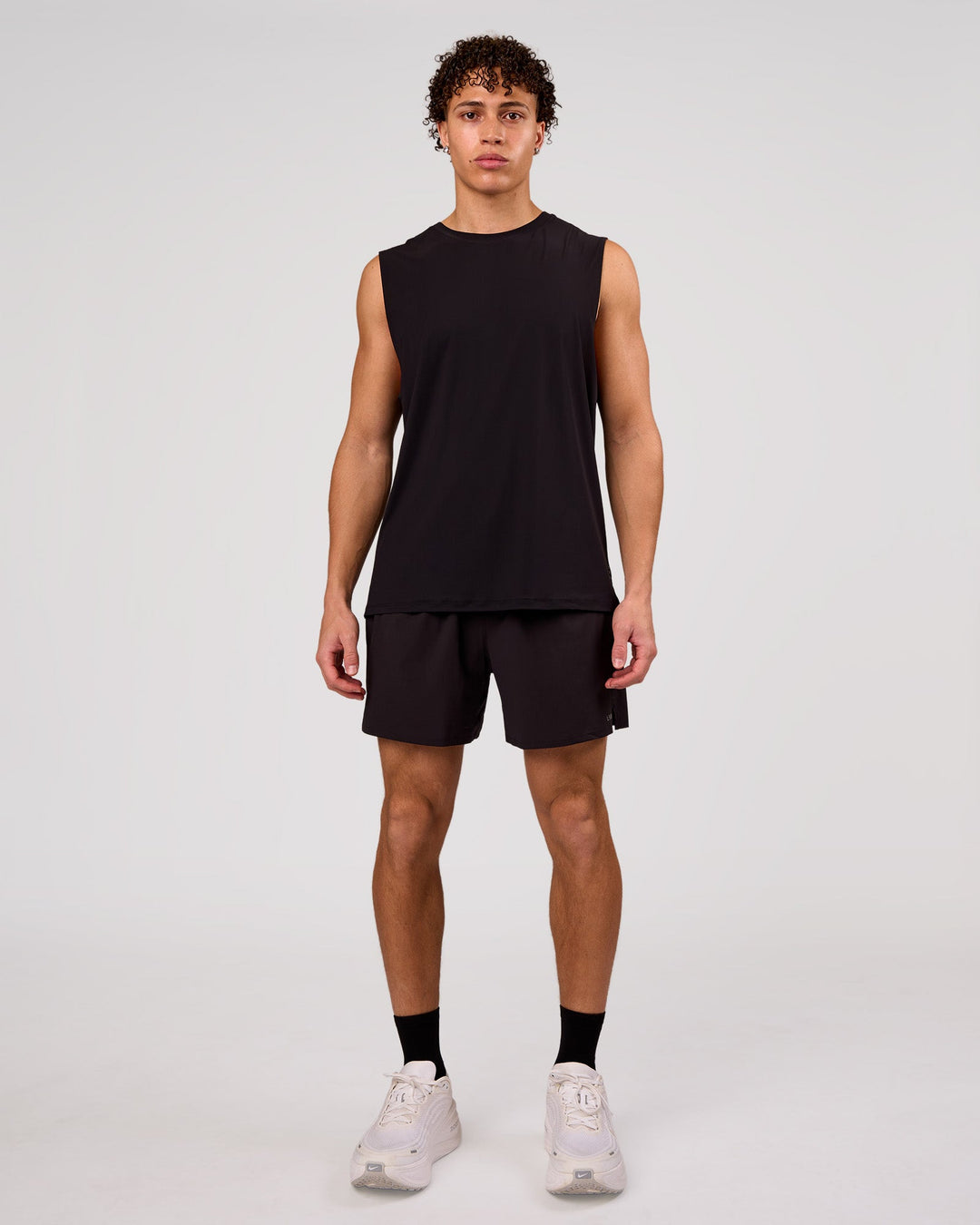 Man wearing Cadence MicroMotion Muscle Tank - Black | Model:Leandro | Size:M - view 3