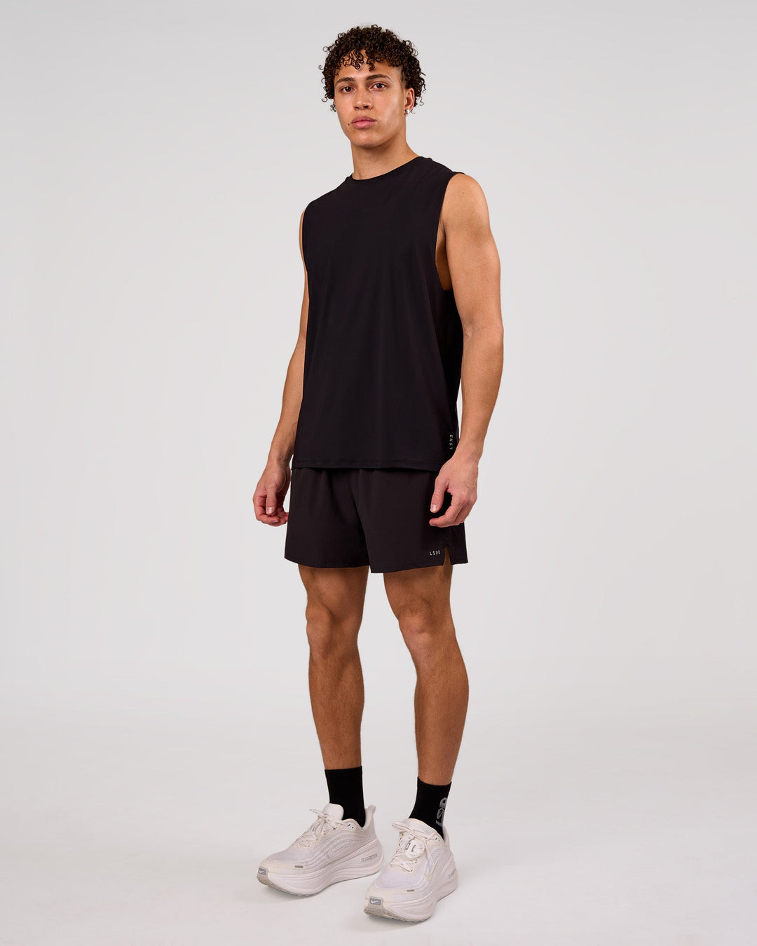 Man wearing Cadence MicroMotion Muscle Tank - Black | Model:Leandro | Size:M - view 5