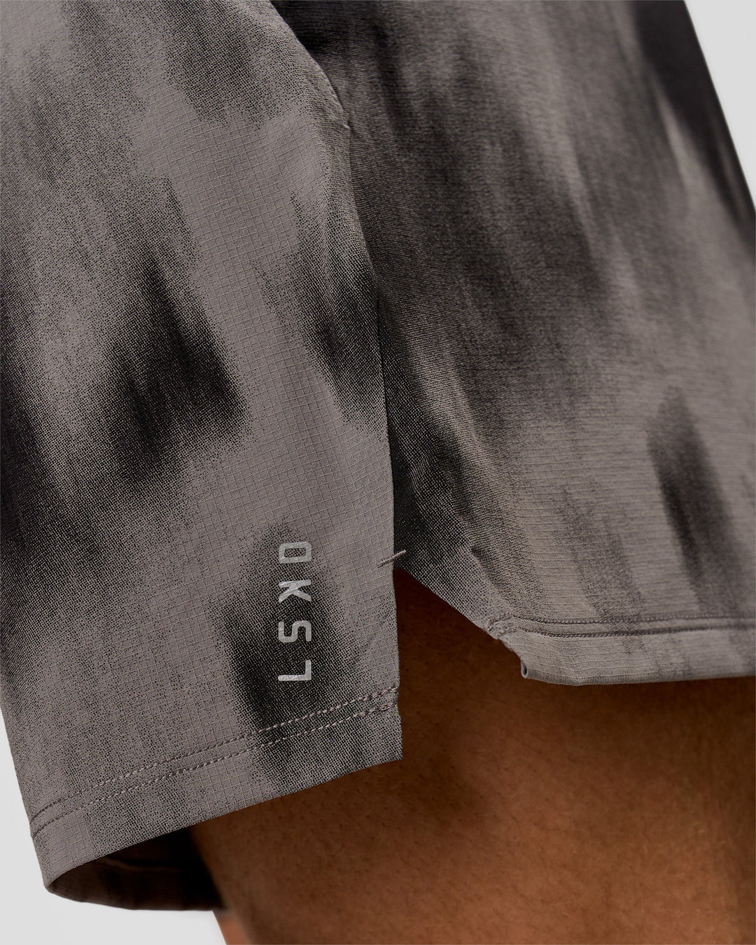 Man wearing Functional Training 7" Short - Bitmap Blur Storm Front | Model:Leandro | Size:M - view 12