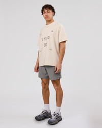 Man wearing Game Plan Heavyweight FLXCotton Oversized Tee - Vanilla Bean | Model:Leandro | Size:M | Thumbnail Index: 14