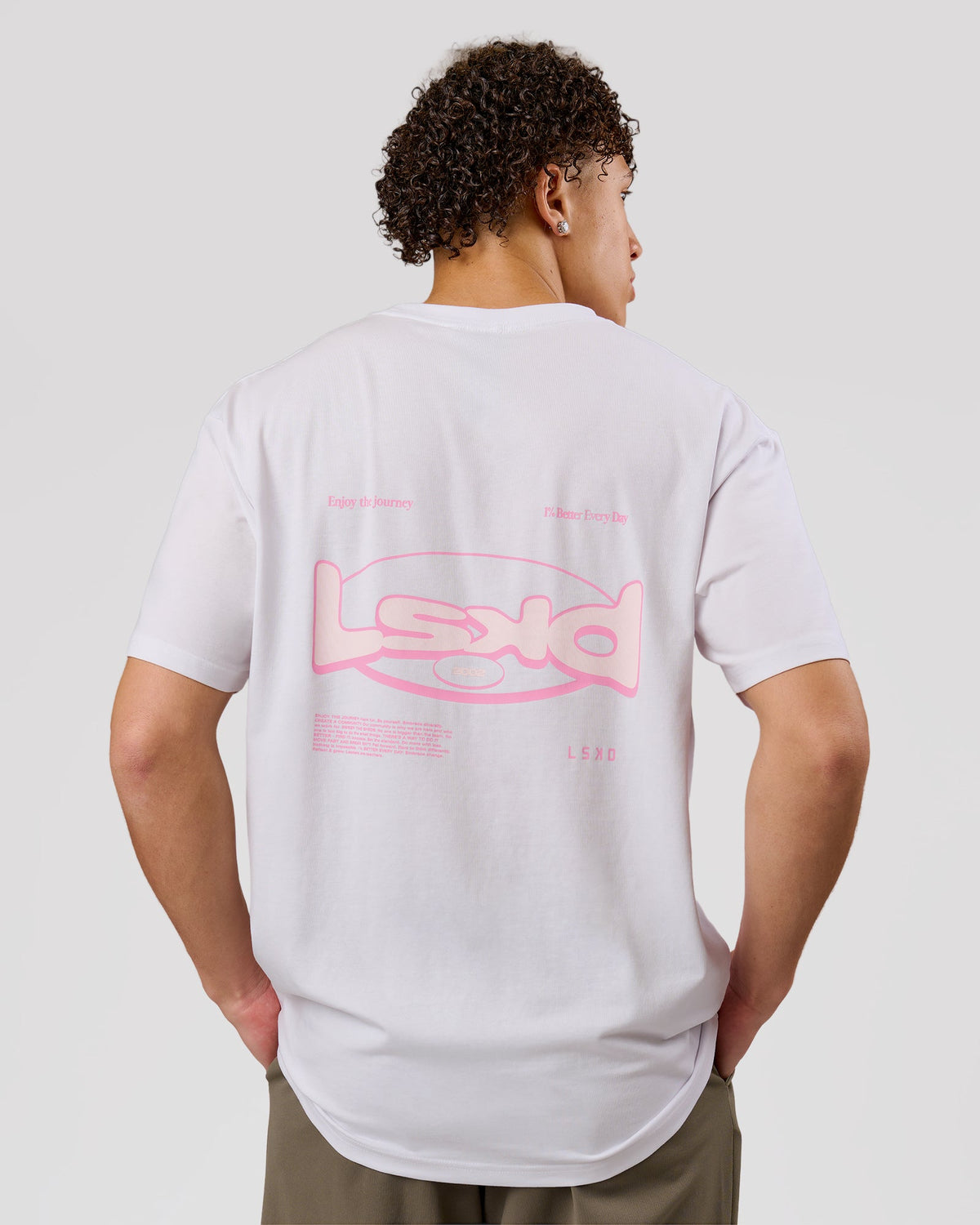 Man wearing Magma FLXCotton Oversize Tee  - White-Pink Rose | Model:Leandro | Size:M - view 2