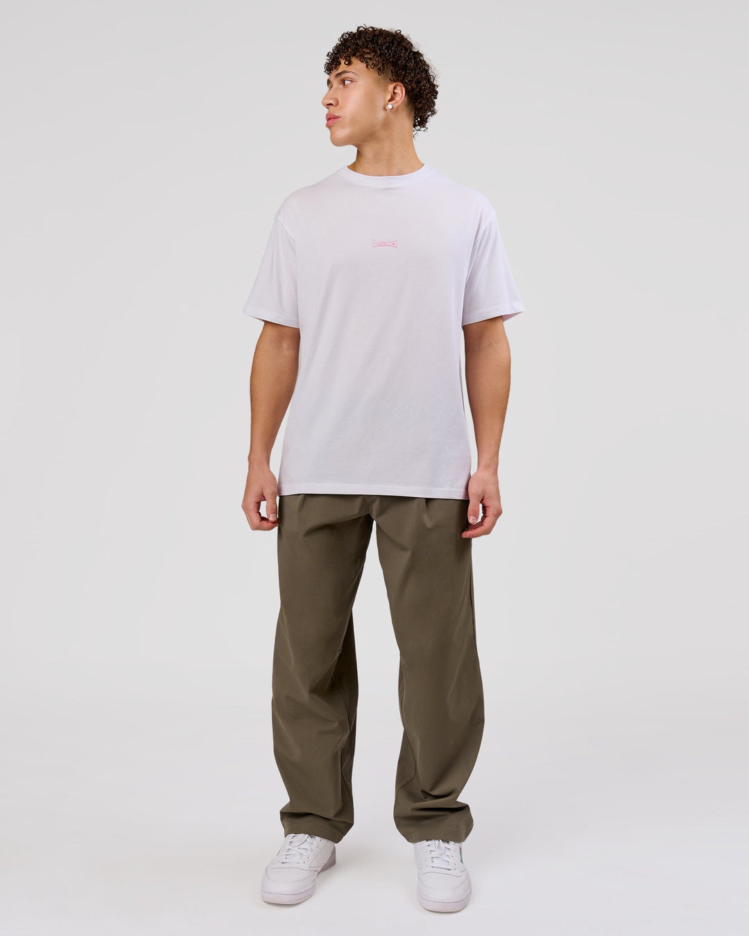 Man wearing Magma FLXCotton Oversize Tee  - White-Pink Rose | Model:Leandro | Size:M - view 10
