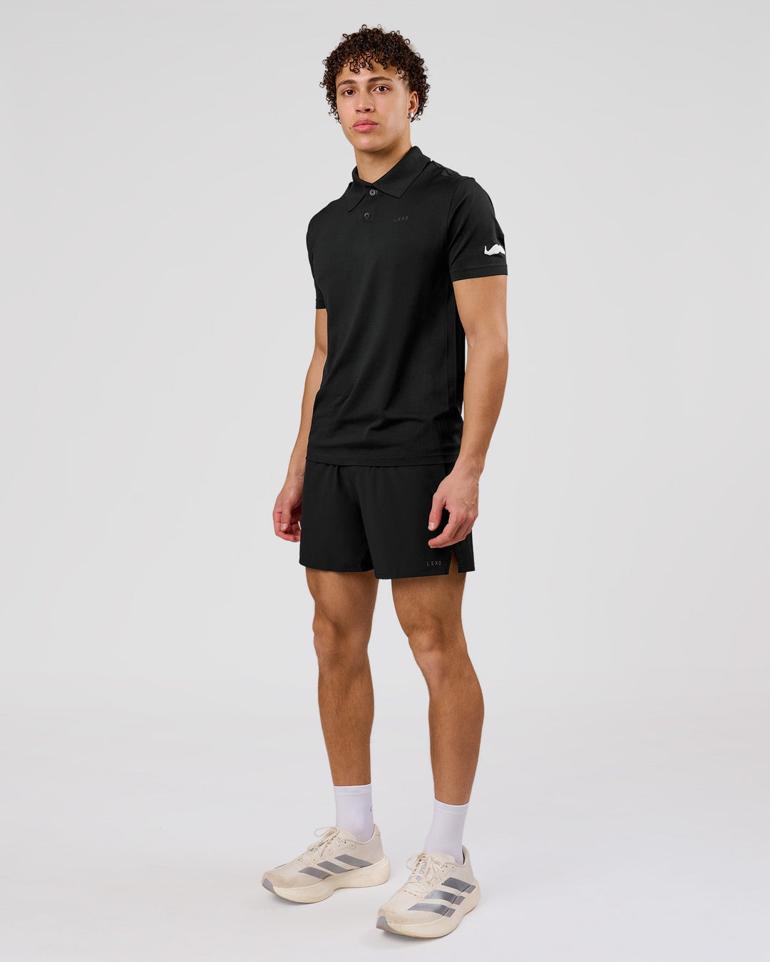 Man wearing Movember x LSKD Pace 5" Lined Running Short - Black | Model:Leandro | Size:M - view 4