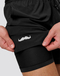 Man wearing Movember x LSKD Pace 5" Lined Running Short - Black | Model:Leandro | Size:M | Thumbnail Index: 4