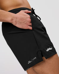 Man wearing Movember x LSKD Pace 5" Lined Running Short - Black | Model:Leandro | Size:M | Thumbnail Index: 6