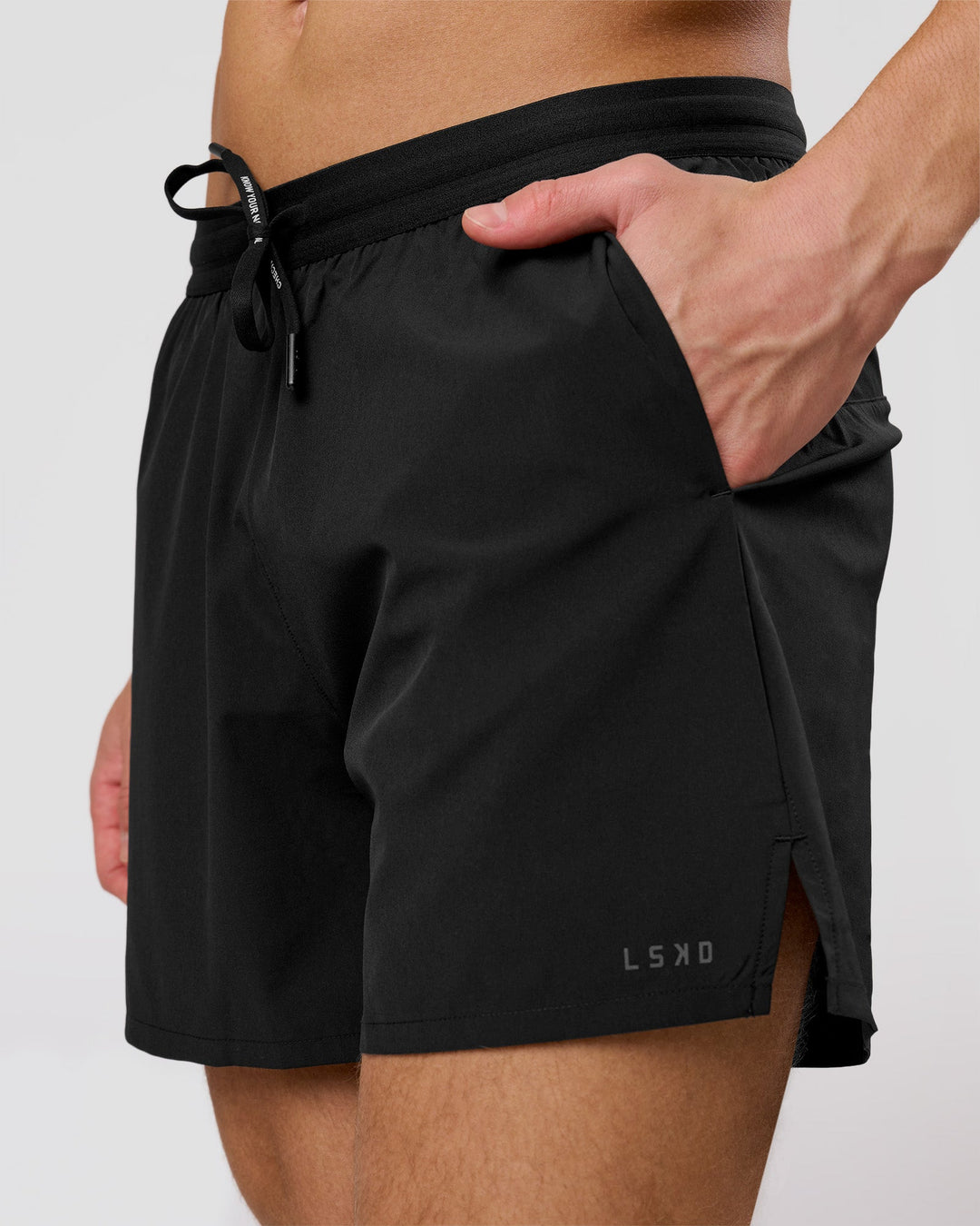 Man wearing Movember x LSKD Pace 5" Lined Running Short - Black | Model:Leandro | Size:M - view 9