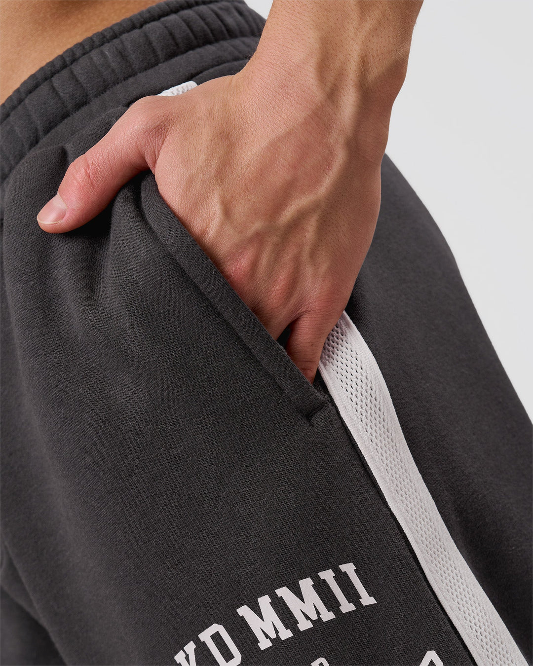 Man wearing Playbook Baggy Cuffed Track Pant - Onyx-Off White | Model:Leandro | Size:M - view 14