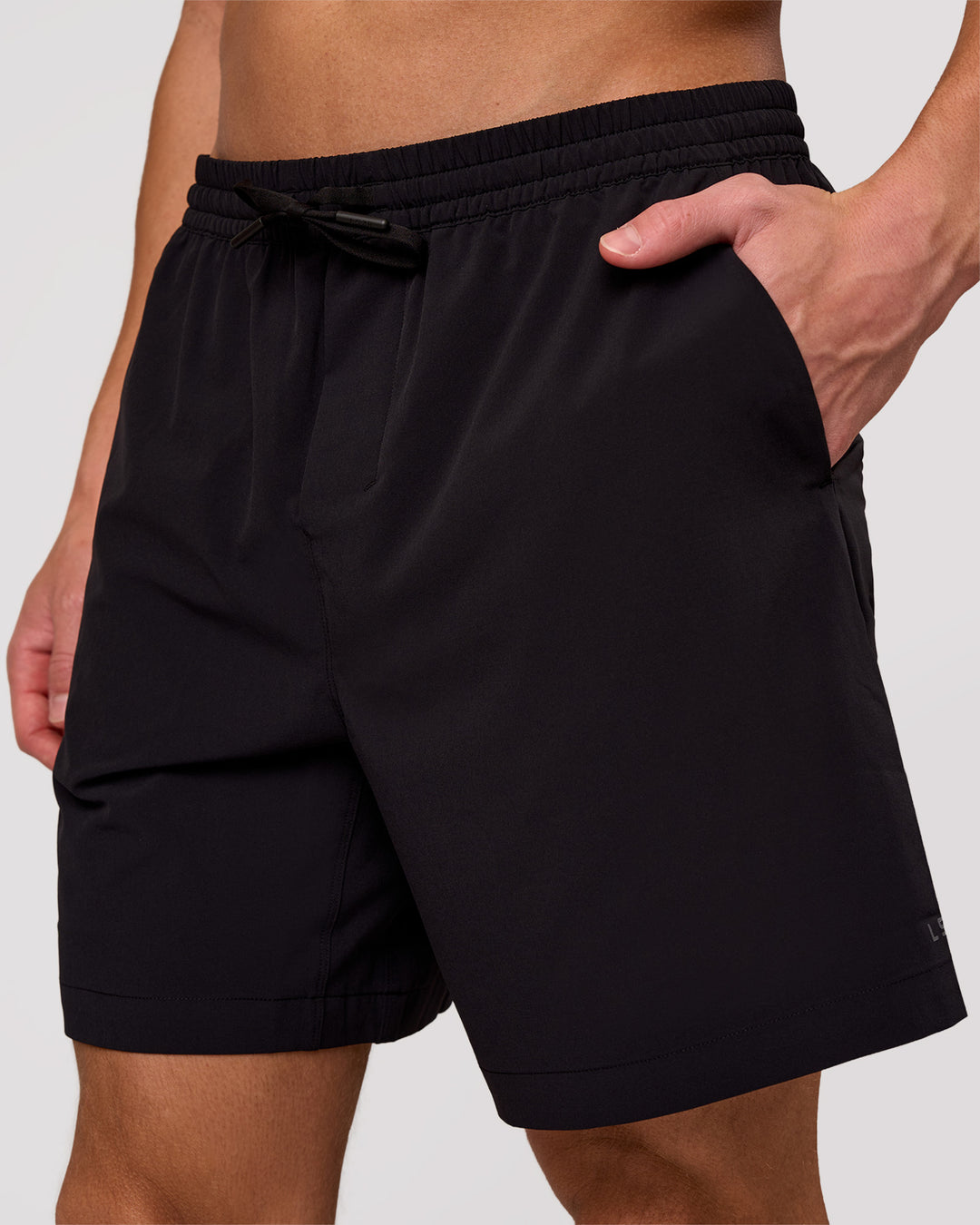 Man wearing Rep Movement 7" Training Short - Black | Model:Leandro | Size:M - view 1
