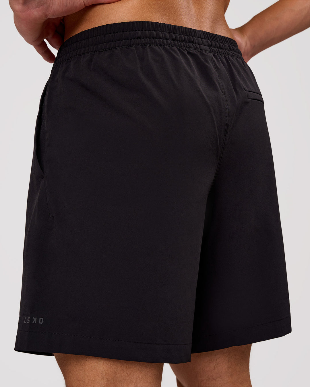 Man wearing Rep Movement 7" Training Short - Black | Model:Leandro | Size:M - view 2