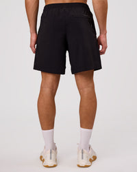 Man wearing Rep Movement 7" Training Short - Black | Model:Leandro | Size:M | Thumbnail Index: 5