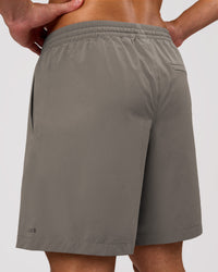 Man wearing Rep Movement 7" Training Short - Storm Front | Model:Leandro | Size:M | Thumbnail Index: 1