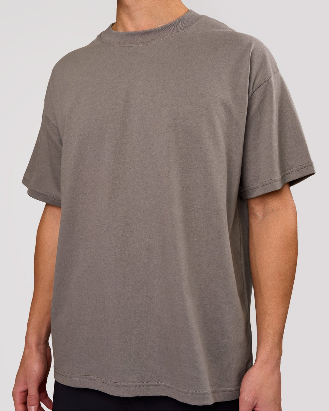 Man wearing Shadow Mark Heavyweight Oversized Tee - Storm Front-Onyx | Model:Leandro | Size:M - view 6