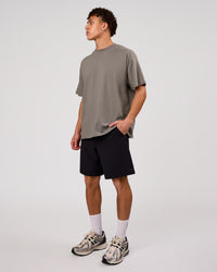 Man wearing Shadow Mark Heavyweight Oversized Tee - Storm Front-Onyx | Model:Leandro | Size:M | Thumbnail Index: 7