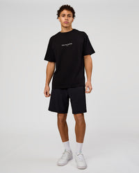 Man wearing VS1 Enjoy The Journey FLXCotton Oversize Tee - Black | Model:Leandro | Size:M | Thumbnail Index: 3