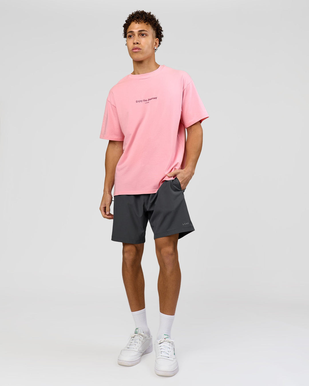 Man wearing VS1 Enjoy The Journey FLXCotton Oversize Tee - Pink Rose | Model:Leandro | Size:M - view 13