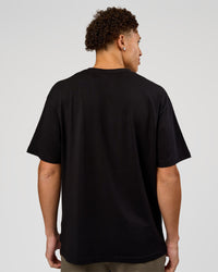 Man wearing VS6 1% Better FLXCotton Oversize Tee - Black | Model:Leandro | Size:M | Thumbnail Index: 13