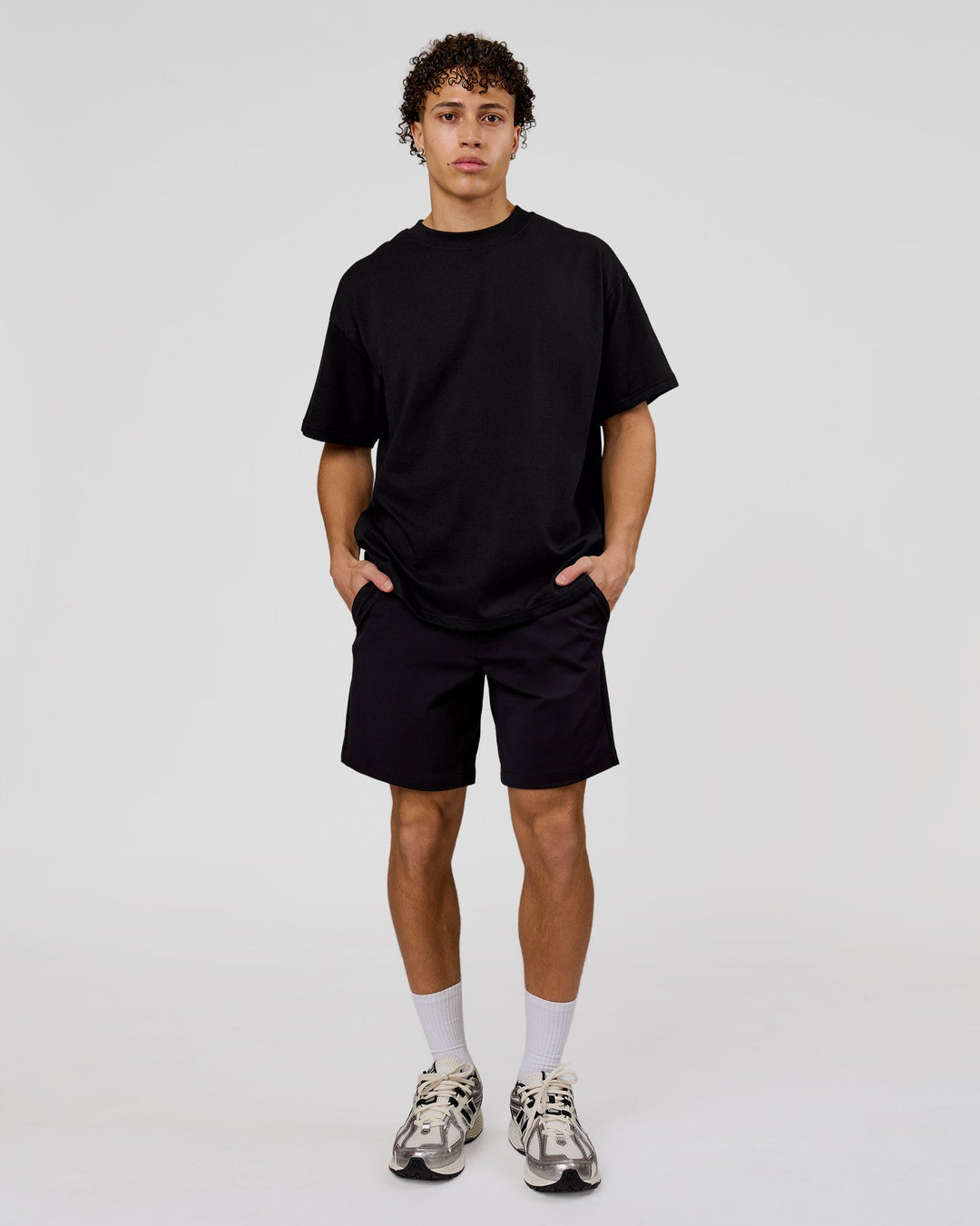Man wearing Shadow Mark Heavyweight Oversized Tee - Black-Onyx | Model:Leandro | Size:M - view 13