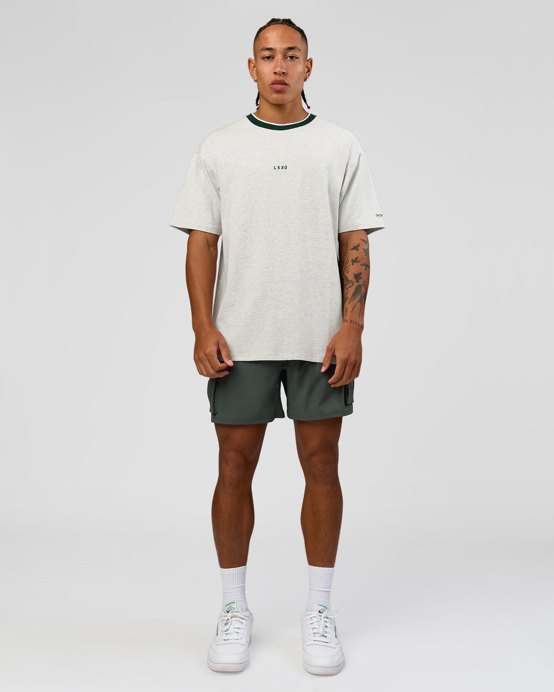 Man wearing Be Here Now Heavyweight FLXCotton Tee Oversize - Silver Marl-Midnight Green | Model:Malebo | Size:M - view 6