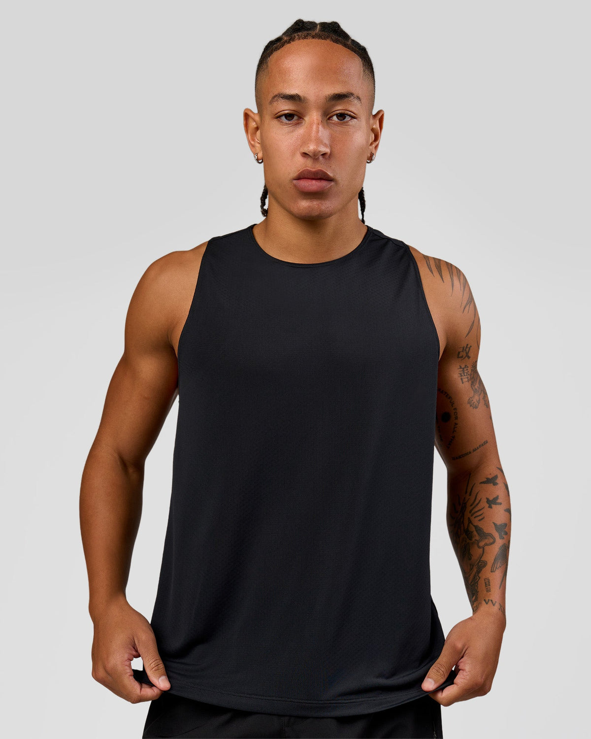 Man wearing Rep Training Tank - Black | Model:Malebo | Size:M