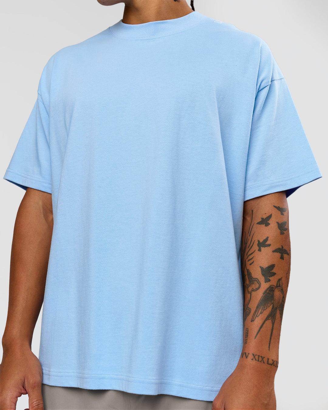 Man wearing Strong is Beautiful Heavyweight Oversized Tee - Open Air | Model:Malebo | Size:M - view 7