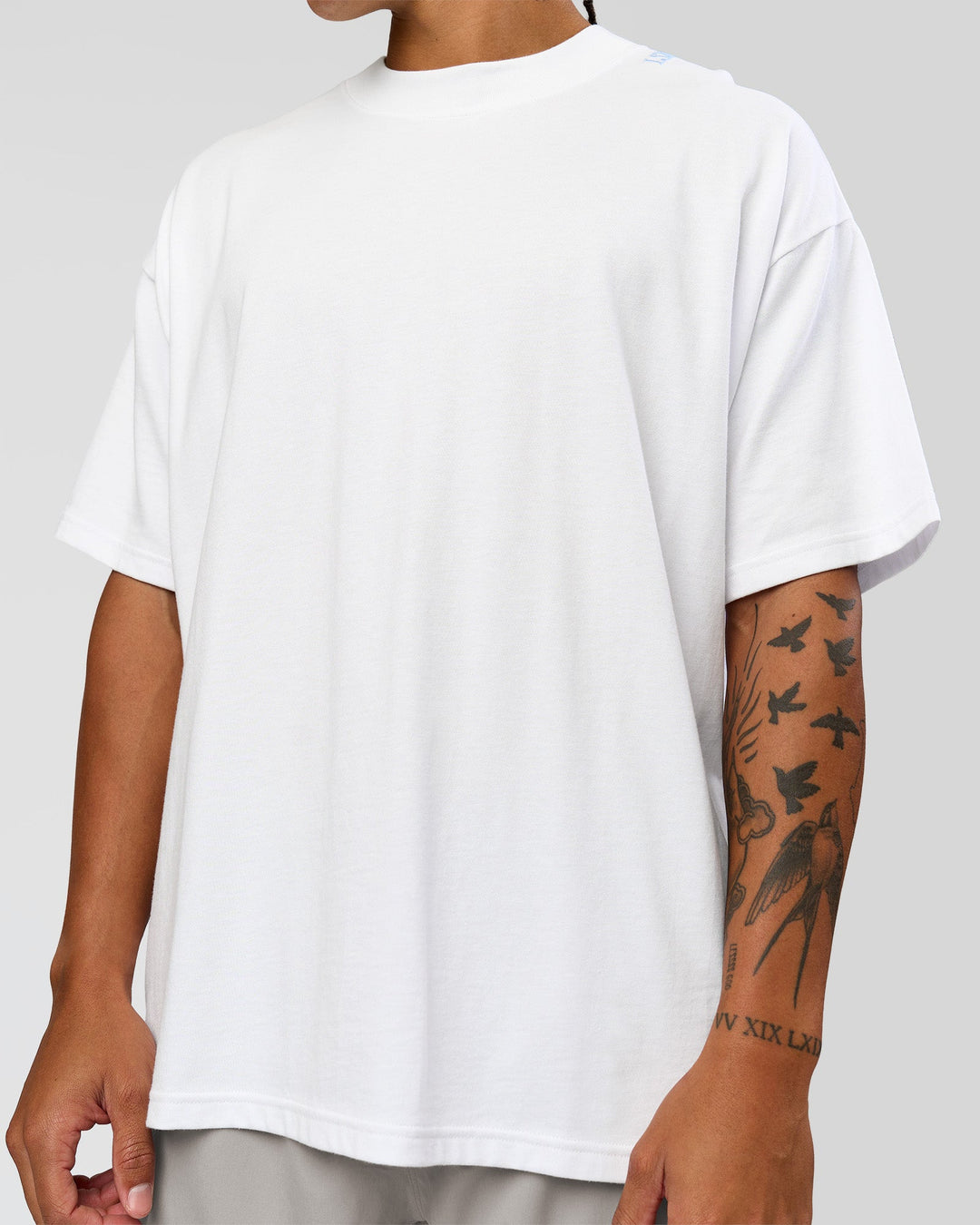 Man wearing Strong is Beautiful Heavyweight Oversized Tee - White | Model:Malebo | Size:M - view 6