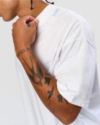 Man wearing Strong is Beautiful Heavyweight Oversized Tee - White | Model:Malebo | Size:M | Thumbnail Index: 6