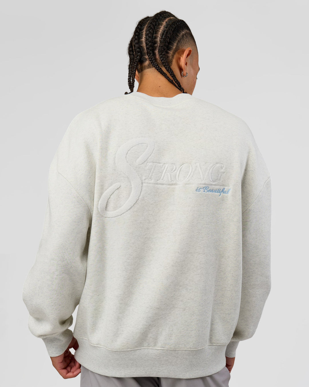 Man wearing Strong is Beautiful Oversized Sweater - Silver Marl | Model:Malebo | Size:M - view 2
