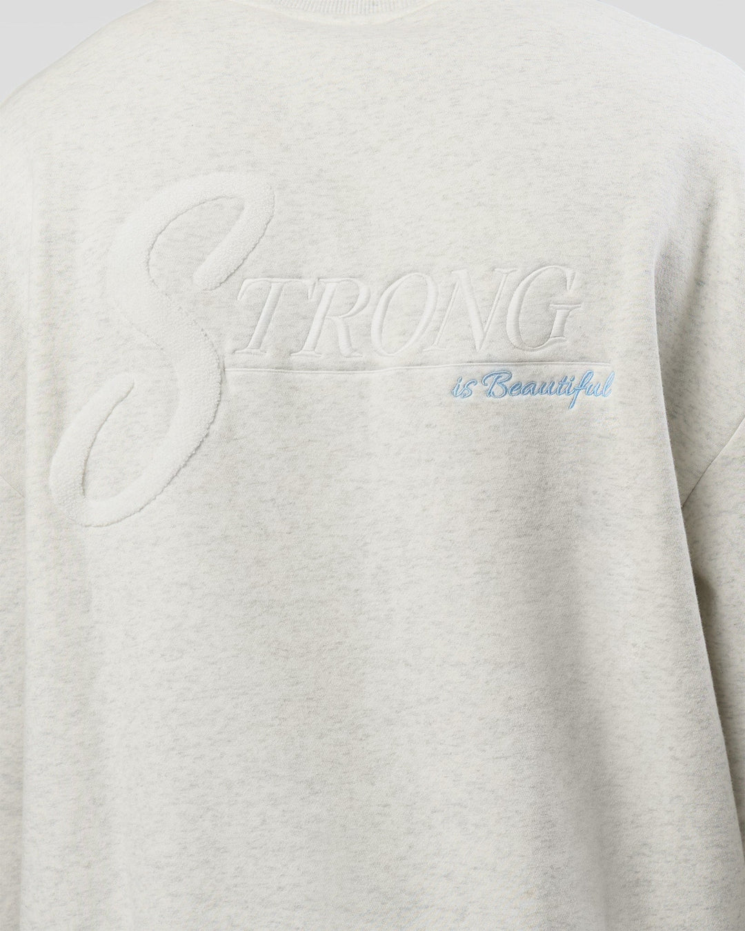 Man wearing Strong is Beautiful Oversized Sweater - Silver Marl | Model:Malebo | Size:M - view 9