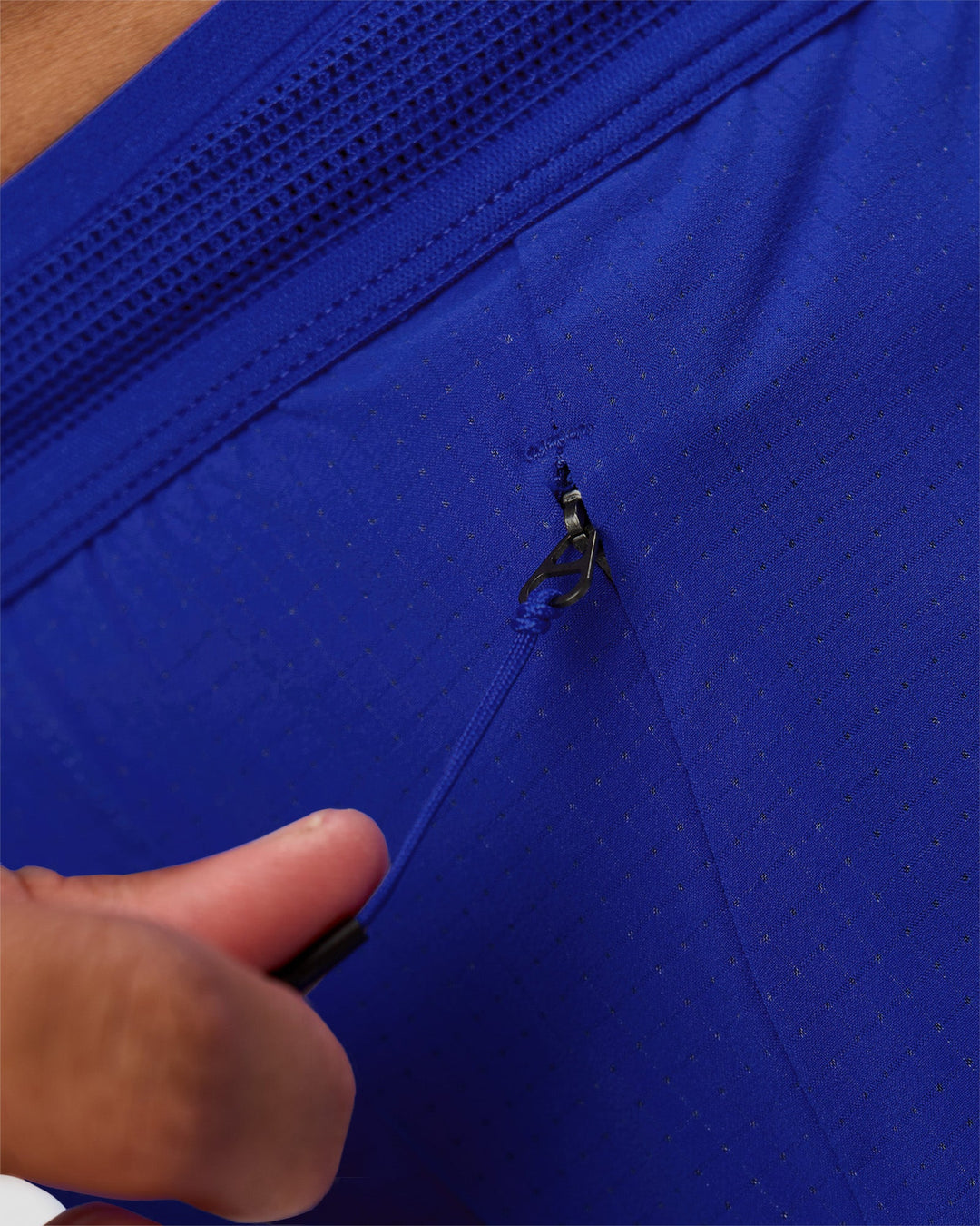 Man wearing UltraAir 5" Lined Performance Short  - Electric Indigo | Model:Malebo | Size:M