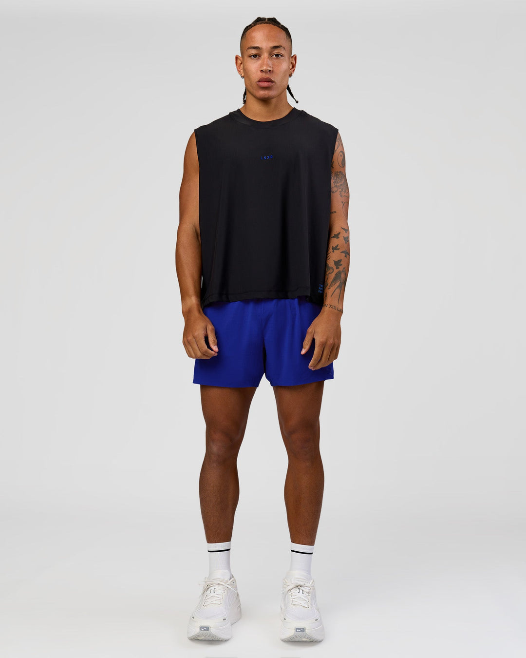 Man wearing UltraAir 5" Lined Performance Short  - Electric Indigo | Model:Malebo | Size:M