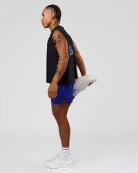 Man wearing UltraAir 5" Lined Performance Short  - Electric Indigo | Model:Malebo | Size:M