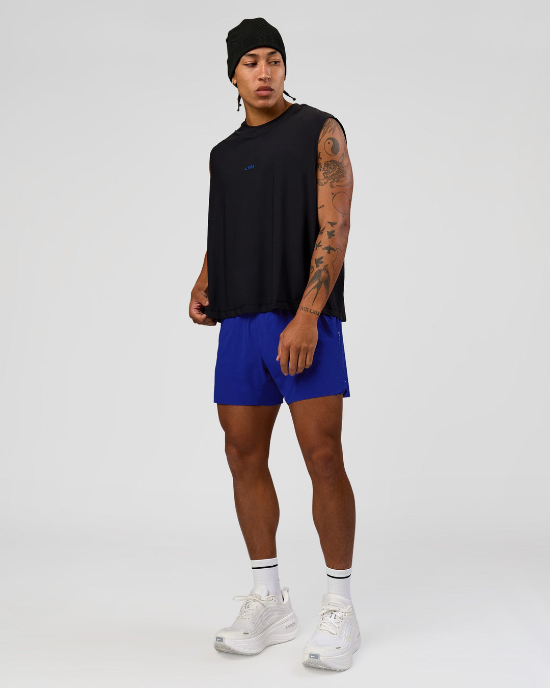 Man wearing UltraAir 5" Lined Performance Short  - Electric Indigo | Model:Malebo | Size:M